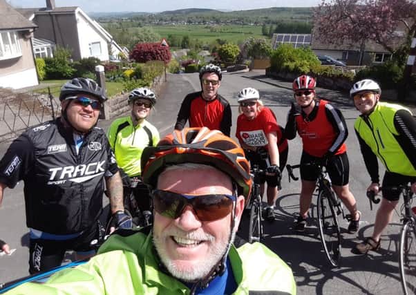 Dave Jordan (front) with Fleetwood and Barrow Lifeboat volunteers during the sponsored cycle ride from Barrow to Fleetwood.