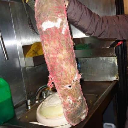 Trading Standards bosses have revealed the filthy conditions which cost a Blackpool takeaway Â£6,000.
 The Indian Palace on Lytham Road was fined by Blackpool Magistrates fter a series of food dafety and hygiene breaches.