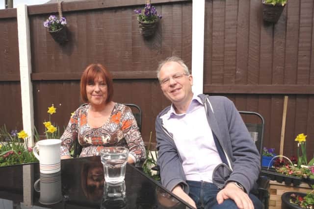 Ward councillors Kath Benson and Martin Mitchell in the garden of the Community House