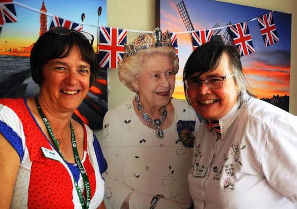 Matron Julie Huttley, Medical Director Dr Susan Salt and Her Majesty at the tea party at Trinity Hospice