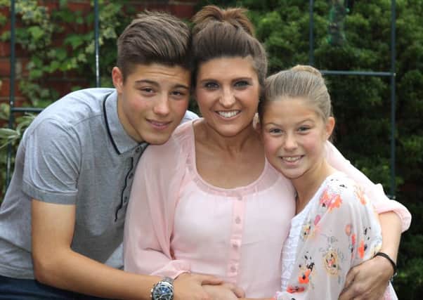 Sarah Colledge pictured with her two children Will and Eve last year