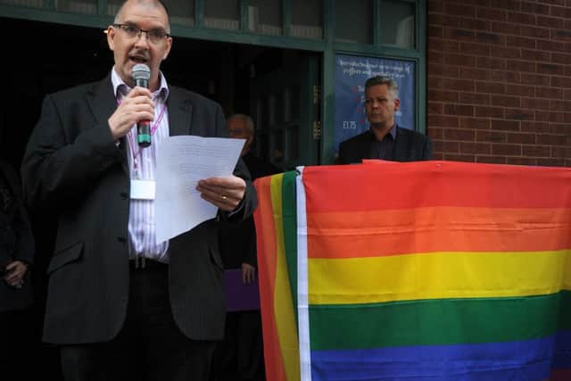 Members of Blackpool's LGBT community held a vigil outside the Flying Handbag pub to mourn the victims of Orlando's mass shooting. Councillor Graham Cain representing the council makes a speech