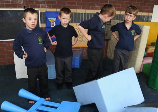 Pupils at Park Community Academy in Blackpool were left devastated after teenage vandals left a trail of destruction around the school over the weekend Surveying the chairs strewn around the playground are Connor, Alfie, Rio and Louie