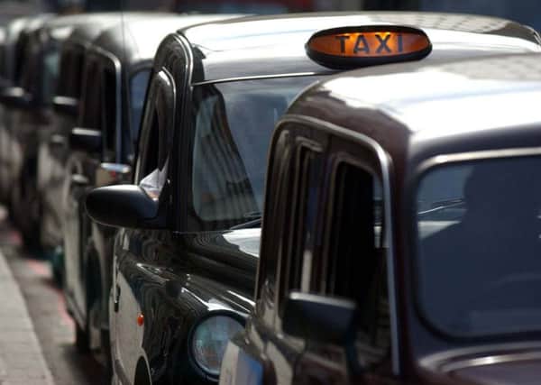 A passenger raged at a woman taxi driver