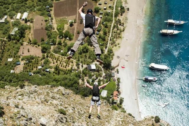 Base jumper Julian Deplidge, 39, jumping in Portugal