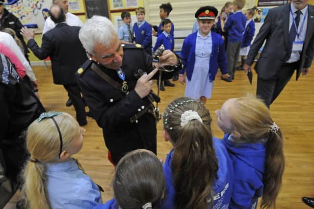 High Sheriff of Lancashire John Barnett MBE talks to some of the pupils.