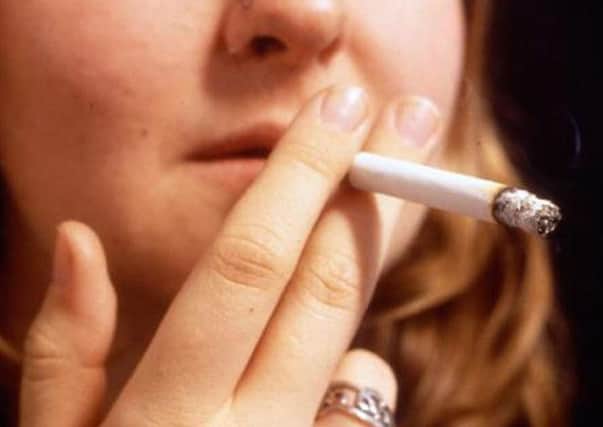 Police monitor ban on smoking in cars