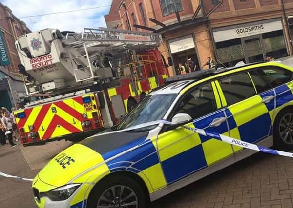 Glass panels have fallen from a shop in Blackpool.
Picture by Ross Dickinson