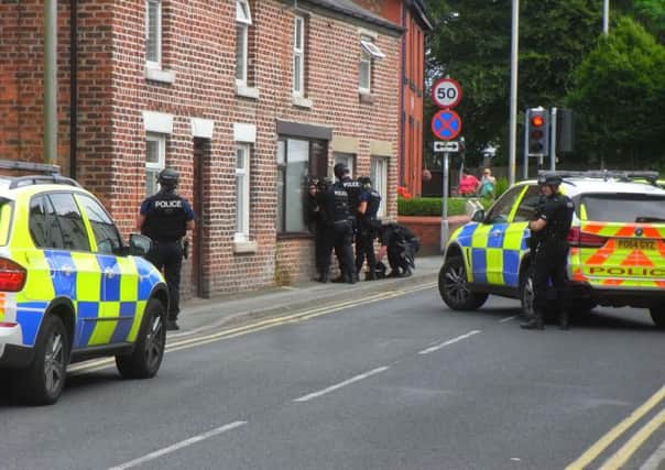 Armed police enter house in Freckleton