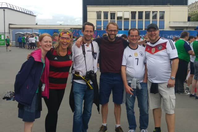 Jenny  (left) and partner Ben Robinson with German fans at the Northern Ireland v Germany game in Paris, Euro 2016