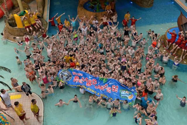 The water park, on Blackpool South Promenade, broke the world record for the most people going down a water slide in one hour.