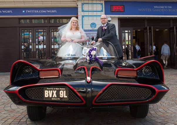 DC fans Sarah Clayton and Richard Ashworth tied the knot with the help of a 1960s Batmobile. Picture by Somerside Photography Ltd