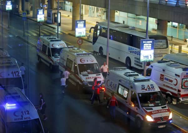 Turkish rescue services gather outside Istanbul's Ataturk airport.