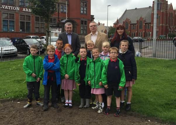 Councillors Mark Smith and Ian Coleman with staff and pupils from St John's Primary School
