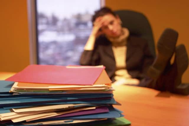 Staff are feeling exhausted and a heavier workload means they have to eat lunch at their desk