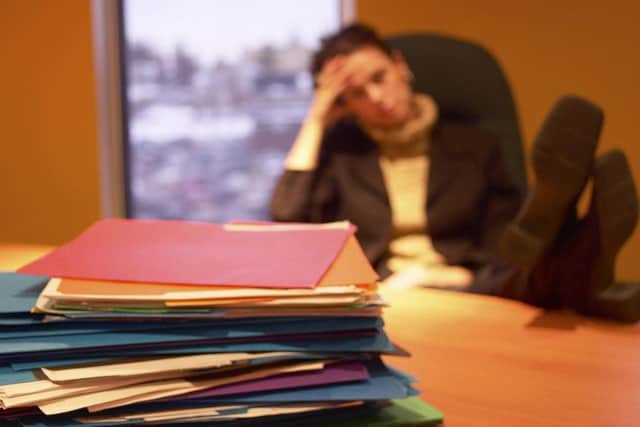Staff are feeling exhausted and a heavier workload means they have to eat lunch at their desk