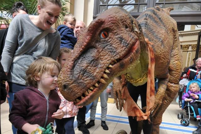 The Jurassic Experience at the Winter Gardens Isaac Warrington, three, makes a new friend