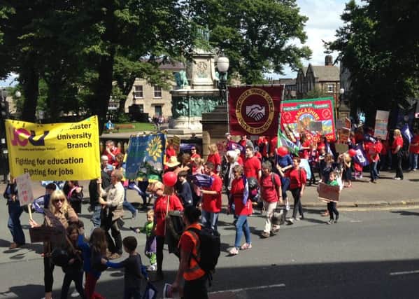 Striking teachers gathered in Lancaster yesterday, as part of the nationwide industrial action over pay, conditions and cuts to funding