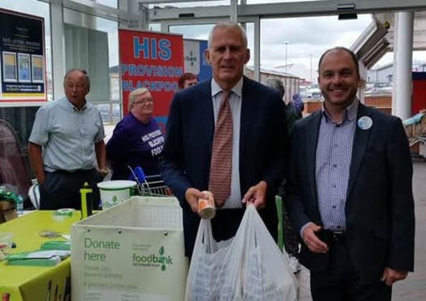 Blackpool South MP Gordon Marsden donates to Tesco Food Collection scheme.