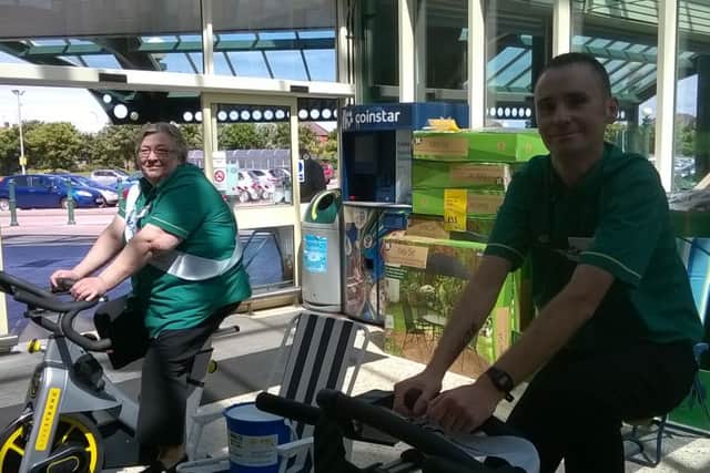 Marian Copping and Martin Beech raising money at Morrisons' fundraiser
