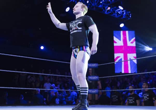 Jack Gallagher being introduced to the crowd at Full Sail University, Orlando, ahead of the WWE Cruiserweight Classic tournament.
