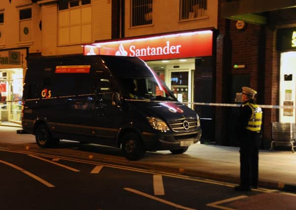 Police at the scene after the ATM raid at Santander in Cleveleys