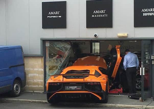 The £150,000 Lamborghini after it smashed into the showroom