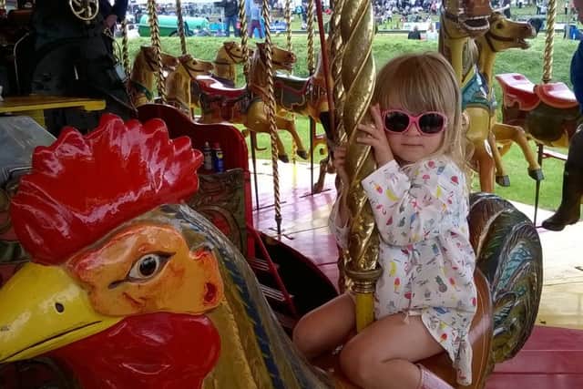 Holly rides a rooster at the Great Eccleston Show