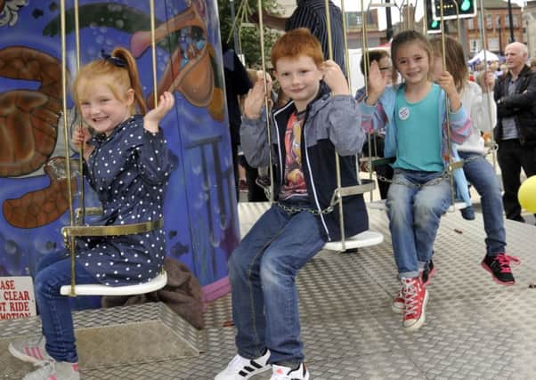 from left, Annabel Egan, five from Blackpool Daniel Egan, seven from Blackpool and Georgina Tribick, seven from Thornton at Tram Sunday in Fleetwood