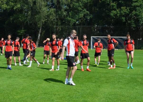 Steven Pressley takes training in Holland as Conor McLaughlin links up with the team again