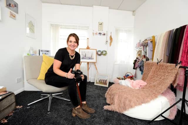 Photographer Jo Boulton who has set up her own business photographing newborn babies as well as weddings.