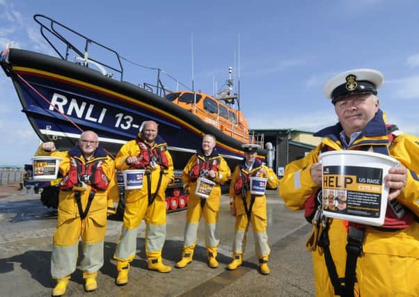 Coxswain Gary Bird launches the Â£275,000 appeal towards a new lifeboat with crew members Phil Da Silva, Tom Stuart, Andy Coyle and Ben McGarry