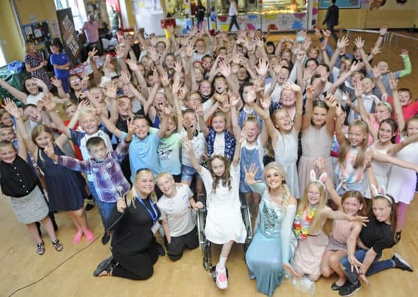 Alison Hayden celebrates the end of year 6 with fellow pupils from Hawes Side Primary