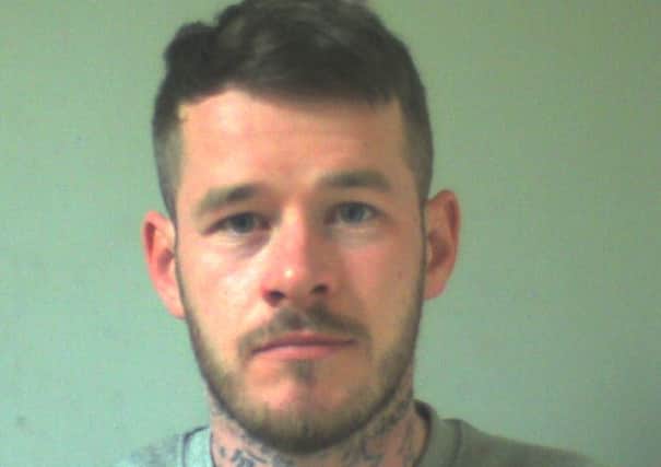 A drunk man who hurled a wine glass at a singer over a taunt as he rowed with his wife has been caged for 17 months. Sean McDermott, 28, of Chatsworth Avenue, Fleetwood