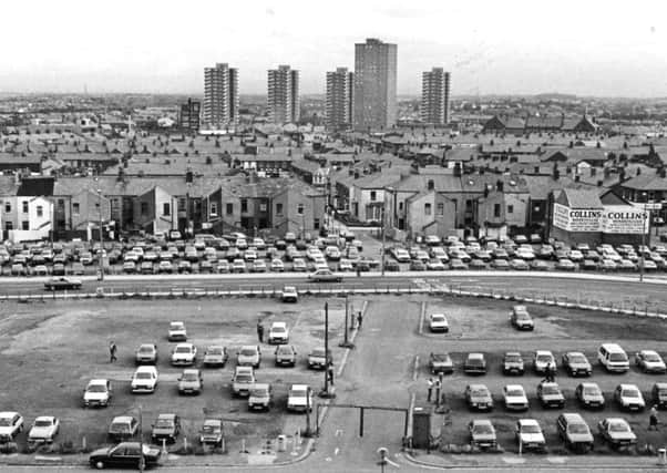 This view of the flats is no longer possible - with Sainsbury's now built on the car park at the forefront of the picture