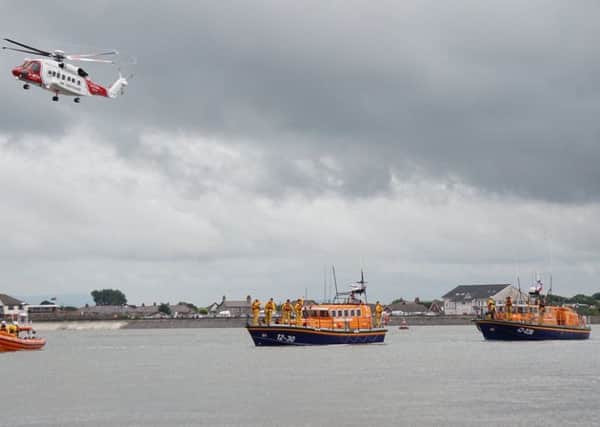 Lifeboat vessels and the HM Coastguard helicopter.