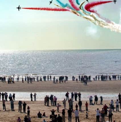 Picture Martin Bostock
The Red Arrows wow the crowds over the beach at the Blackpool airshow.