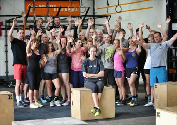 Sarah Trelfa, 22, front, who held a gym competition at CrossFit Gym, Blackpool, pictured with some of the people who took part. It's to raise money towards her VSO project in Bangladesh