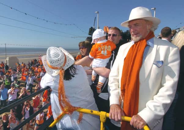 Blackpool FC victory parade down the promenade after their promotion to the Premier League.
Club owner Owen Oyston watches from the bus. PIC BY ROB LOCK
24-5-2010