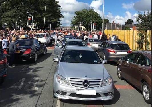 Cars were abandoned as the warning klaxon sounded, so motorists could see the flats fall