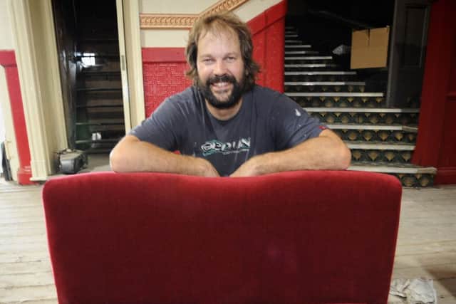 Owner Richard Taylor with a snogging chair