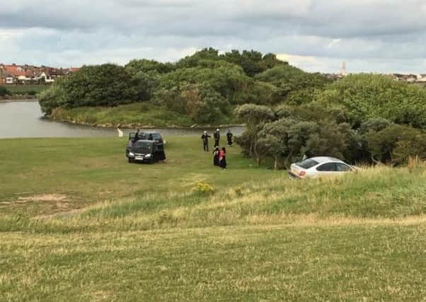 Cars have been driving along the footpath at Fairhaven Lake. Picture by Jonny Hart