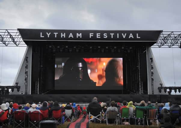 Lytham Proms 2016: A giant screening of the new Star Wars film The Force Awakens. New baddie Kylo Ren takes to the screen.  PIC BY ROB LOCK 3-8-2016