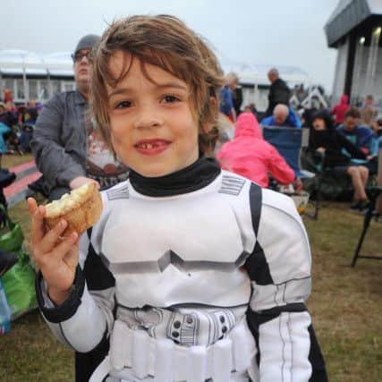 Lytham Proms 2016: A giant screening of the new Star Wars film The Force Awakens. Even Stormtroopers need some tea. Six-year-old Ethan Rimmer tucks in.  PIC BY ROB LOCK 3-8-2016