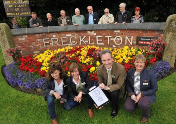 Photo Neil Cross
Britain In Bloom judges Geraldine King and Andrew Jackson in Freckleton to judge it for national best small town awards, with Sue Lee, chairman and Christine Graham, secretary
