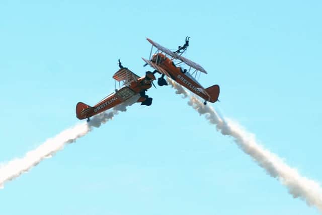 The Breitling wingwalkers perform a close cross-over