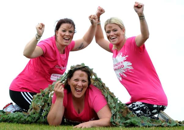 Getting ready for the Blackpool Pretty Muddy in aid of Cancer Research UK. L-r Clare Cookney, Jayne Fort and Helen Bradley along with Eve Whitaker aged 12. Picture by Paul Heyes, Sunday August 07, 2016.