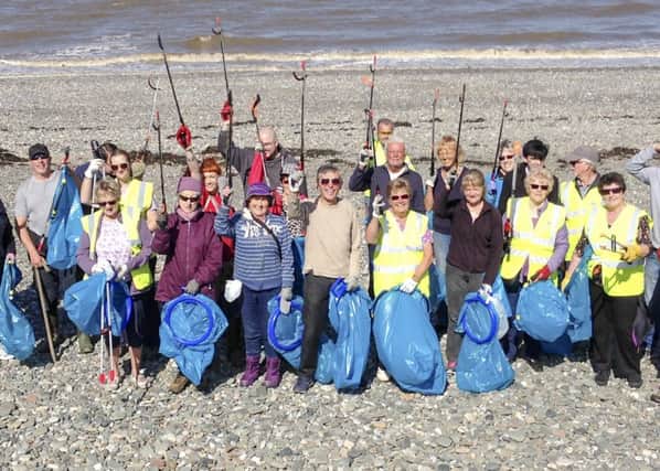 The beach clean-up crew volunteers
