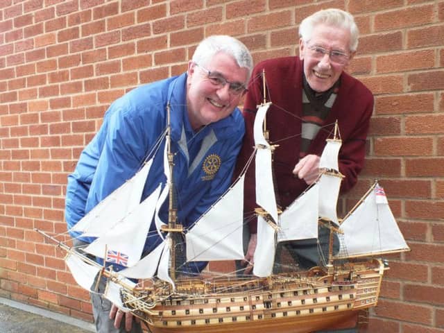 Fleetwood Rotarian GordonÂ Oates (left)Â withÂ AlanÂ RedfordÂ andÂ  theÂ 
modelÂ ofÂ HMSÂ Victory.