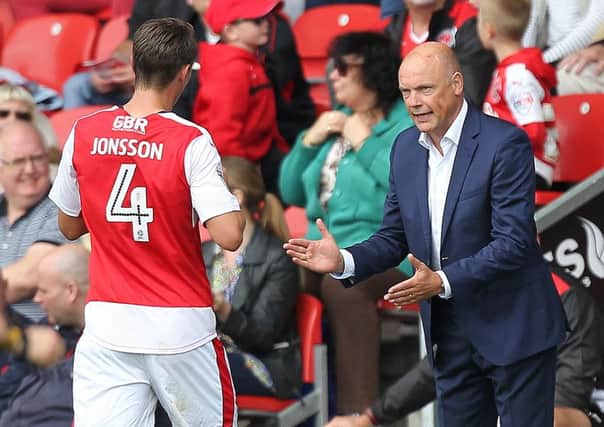 Uwe Rosler passes instructions to Eggert Jonsson